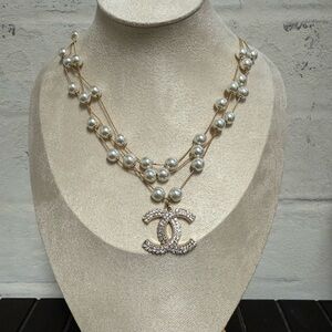 Upcycled Chanel Layered Pearl Necklace with rhinestone pendant.
